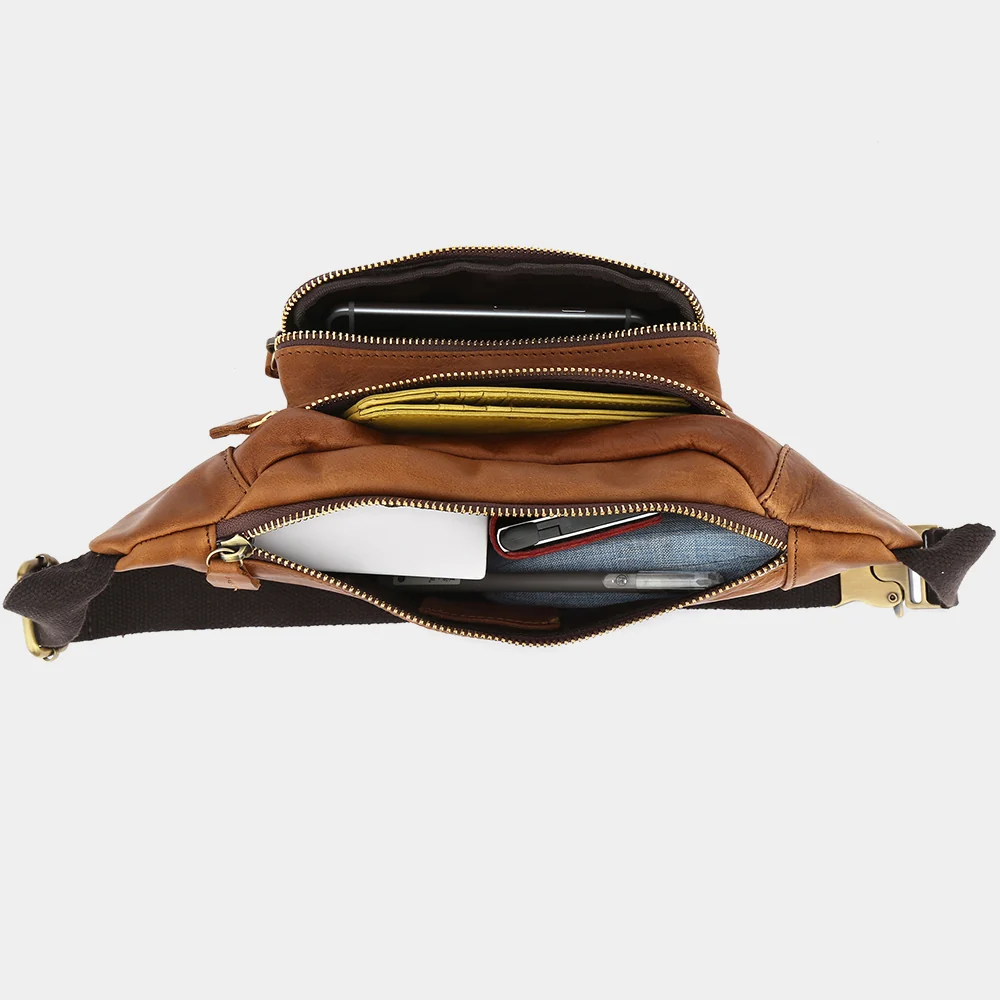 The Alpha open with phone, wallet and daily essentials organized inside