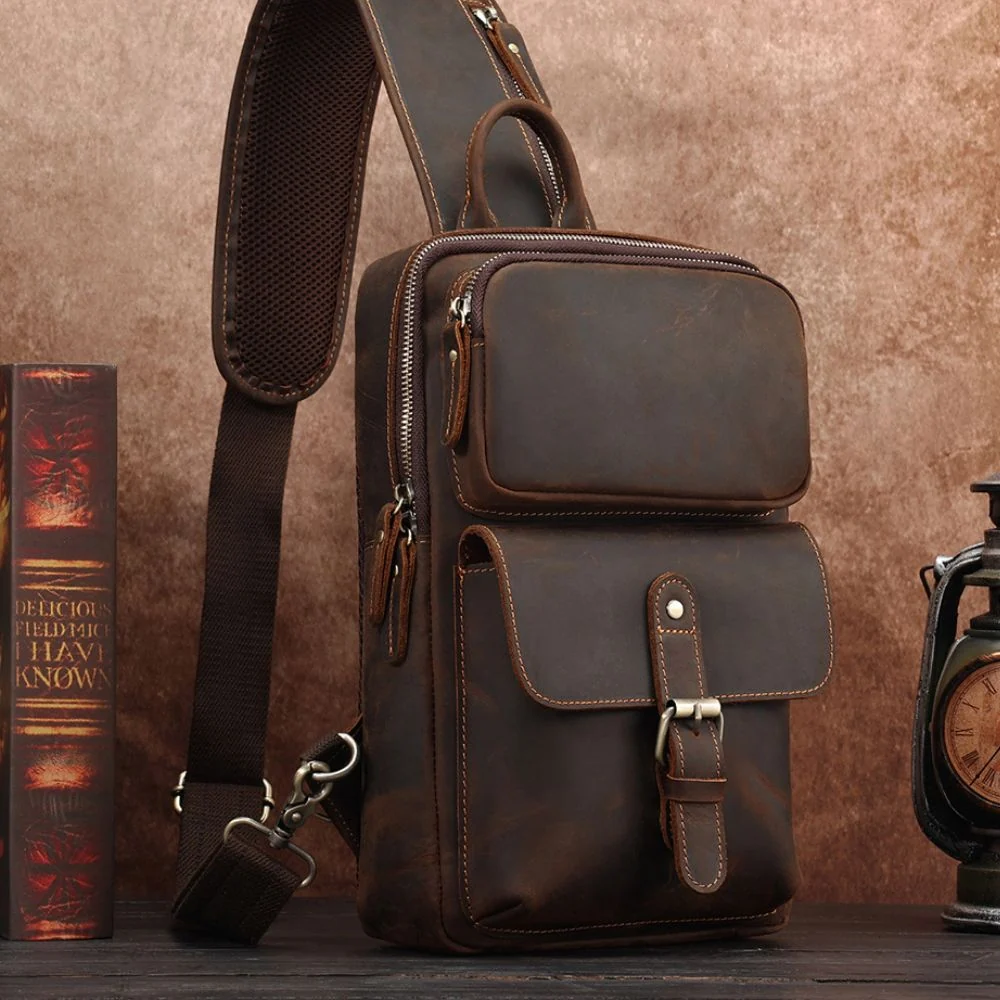 The Obrysus styled beside a book and vintage lantern