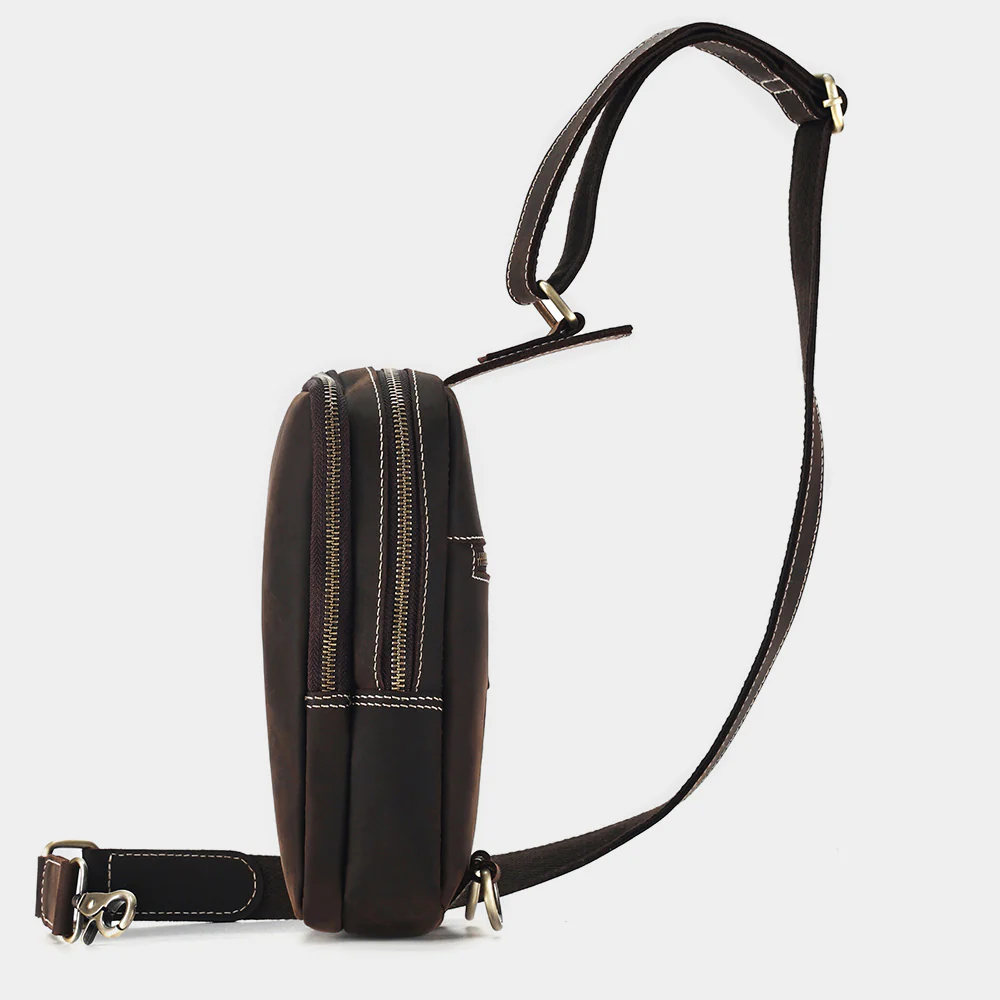 The Blaze sling bag side view showing dual zip compartments