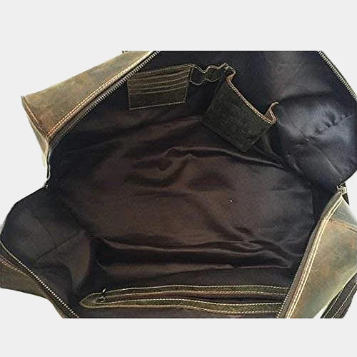 The Coarse duffle open, showing the lined interior organizers