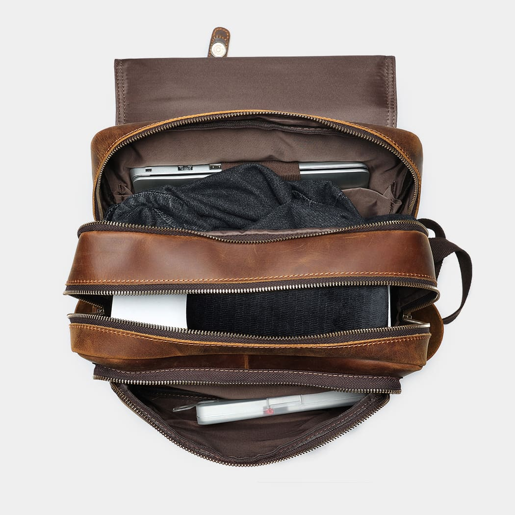 The Compact backpack packed with a laptop and clothing