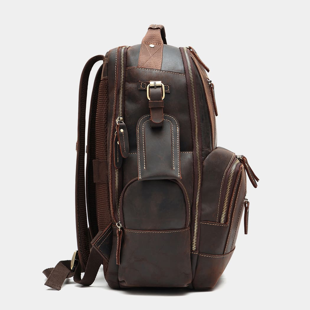 The Standard leather backpack side profile with luggage strap