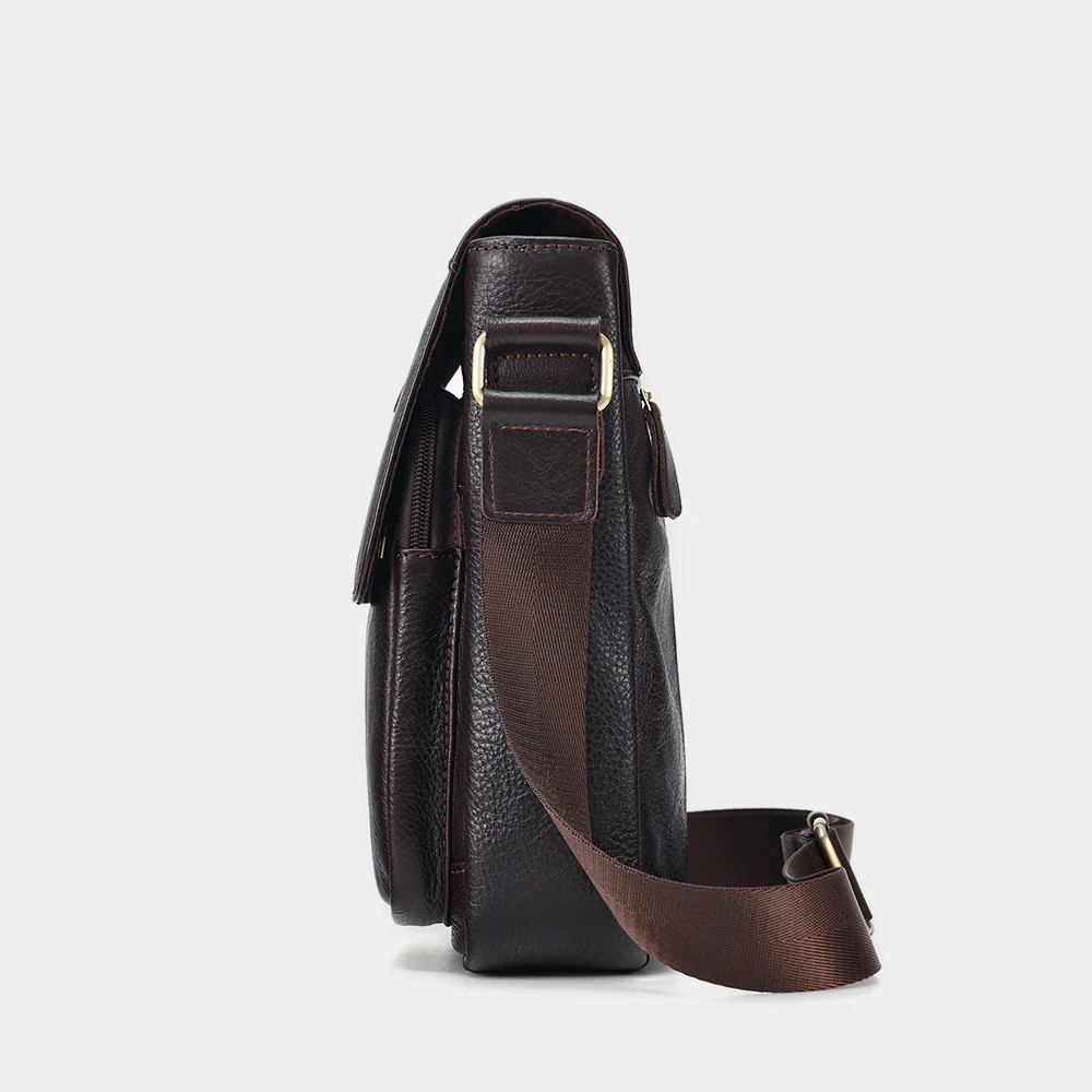 The Calimero leather bag side profile with adjustable strap