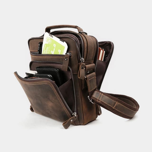 The Man Bag open, showing tablet, wallet and document pockets