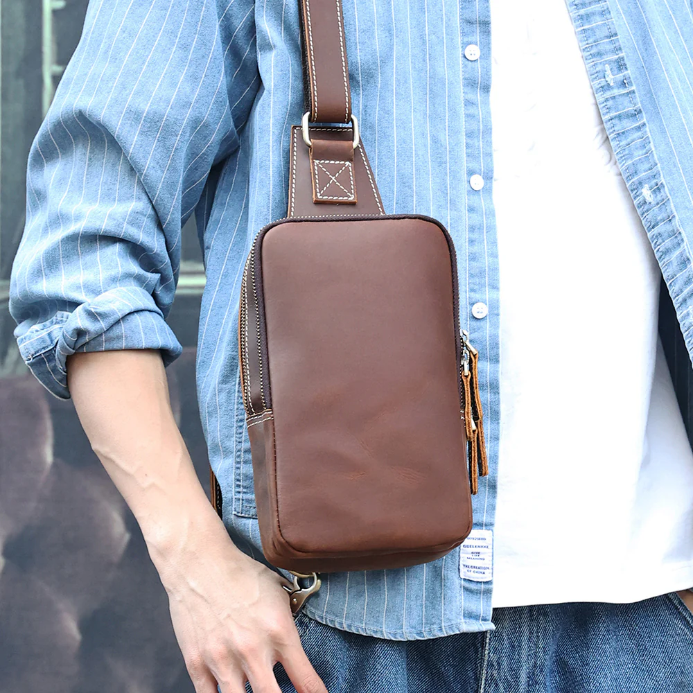 The Blaze leather sling bag worn across the chest
