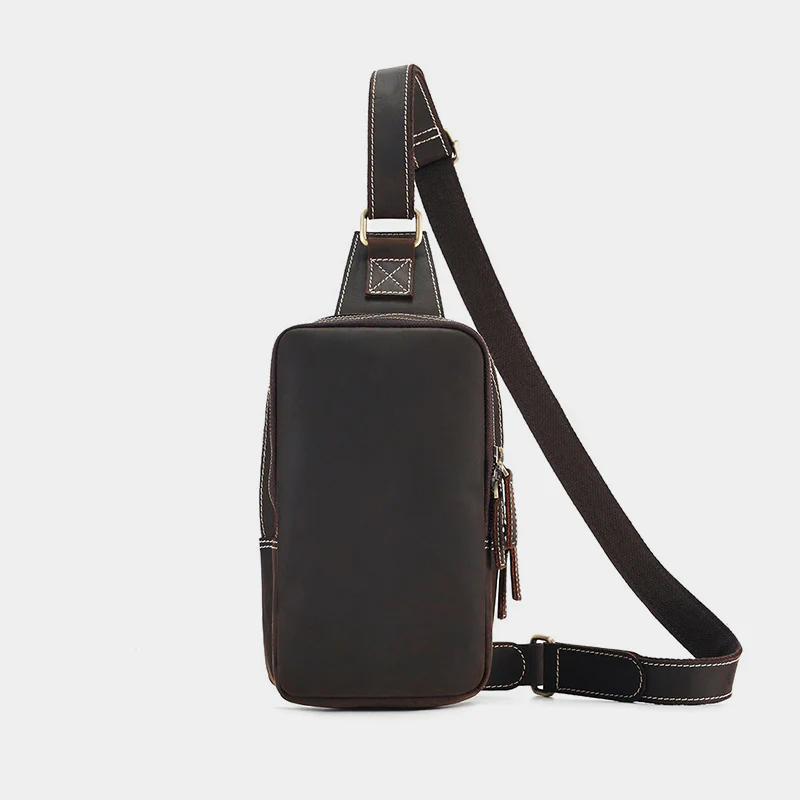The Blaze leather sling bag rear view with webbing strap
