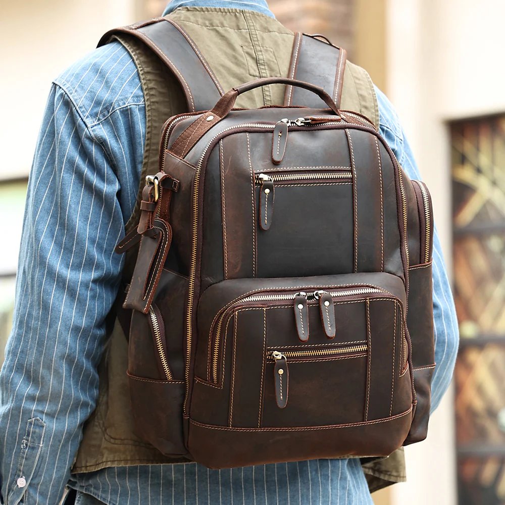 The Standard leather backpack worn on the shoulders