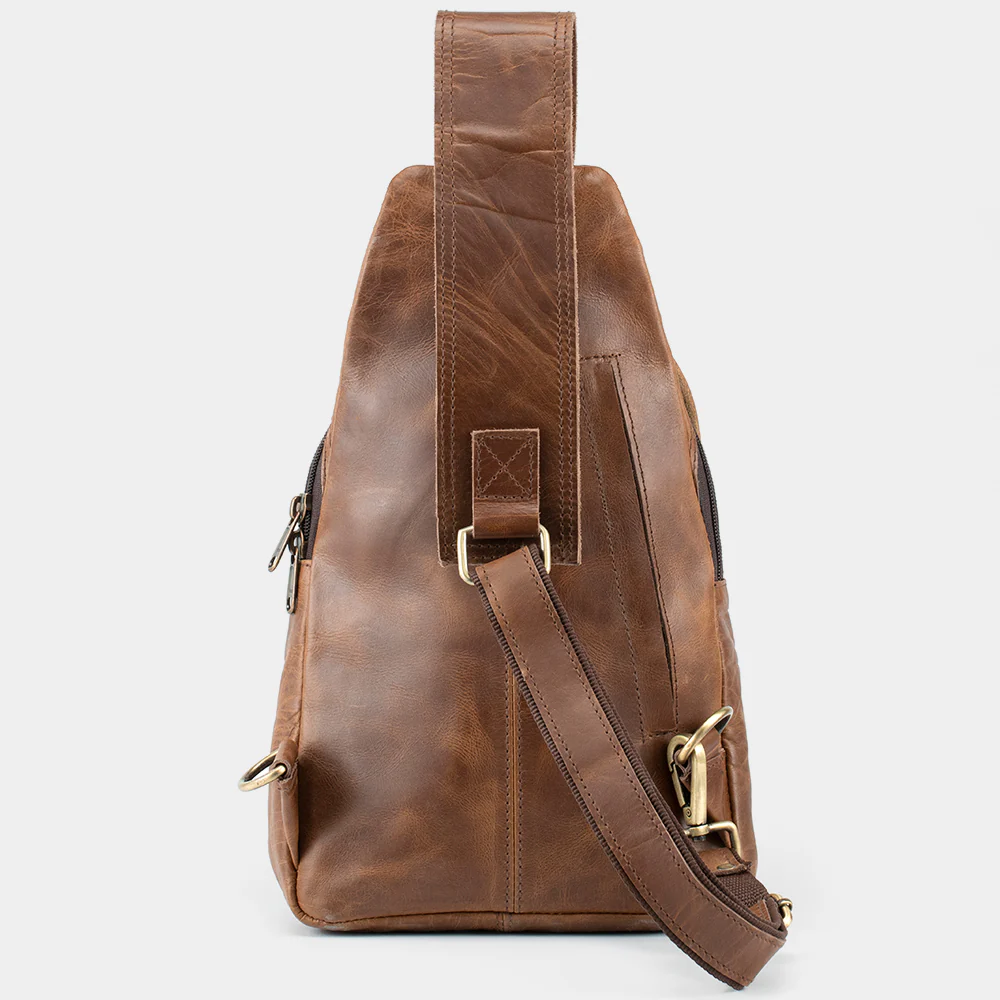 The Cross leather sling bag rear view with padded strap