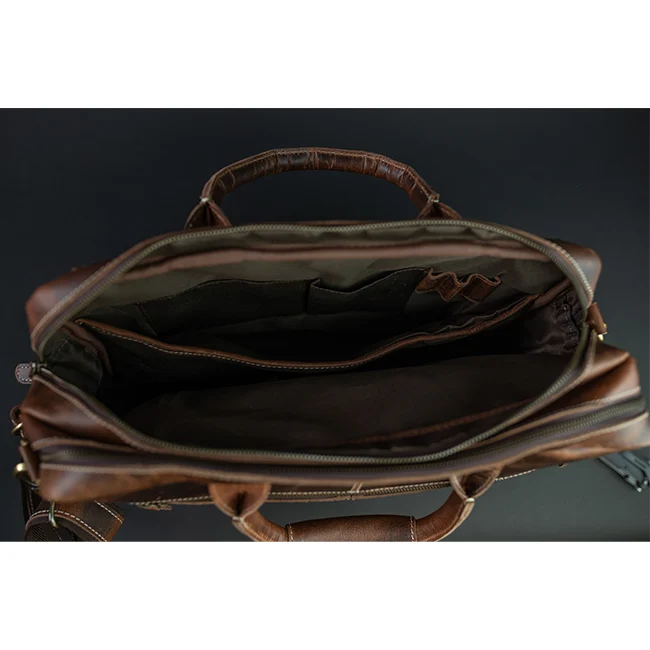 The Pilot briefcase open, showing lined interior sections